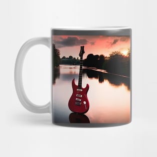 A Red Guitar Stadning On The River Thames in English Countryside At Sunset Mug